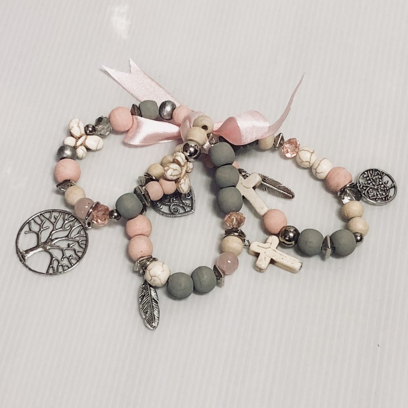 3 BRACELETS PINK WITH CHARMS 